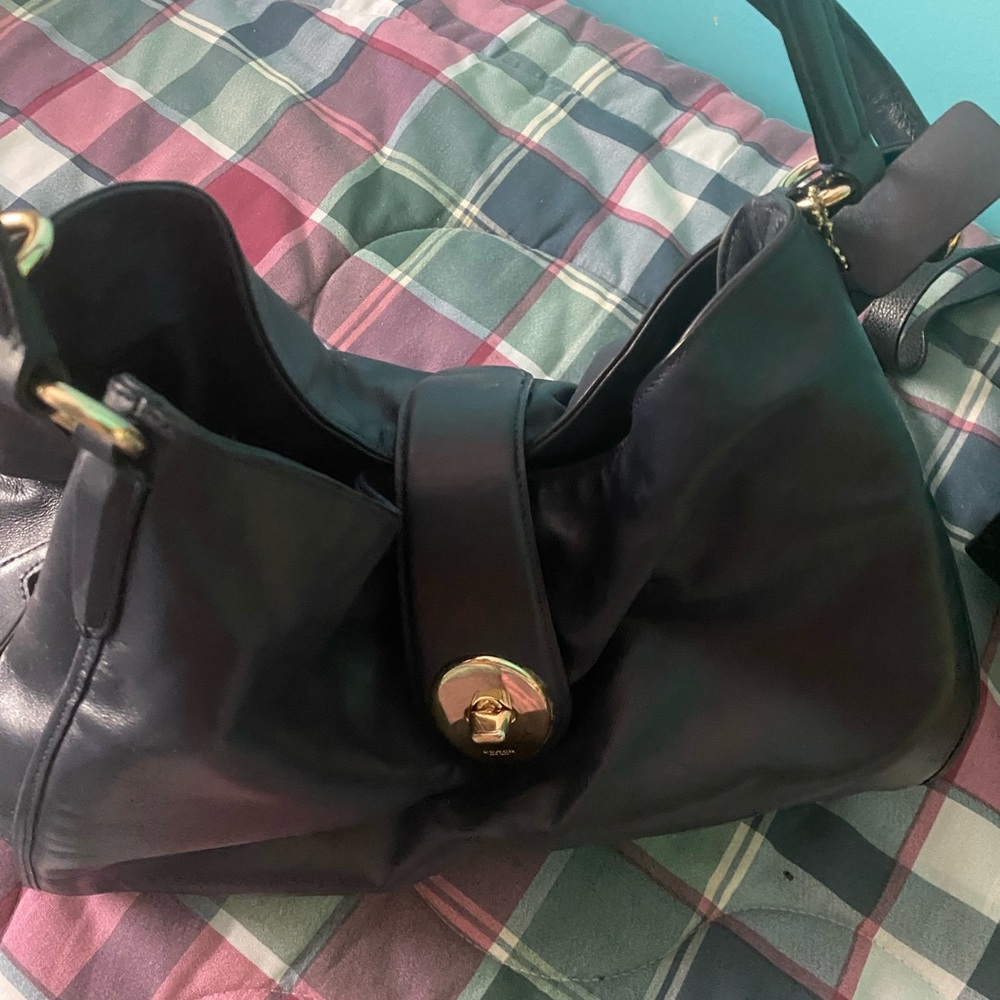 Coach Navy Blue handbag with interior pocket zipper